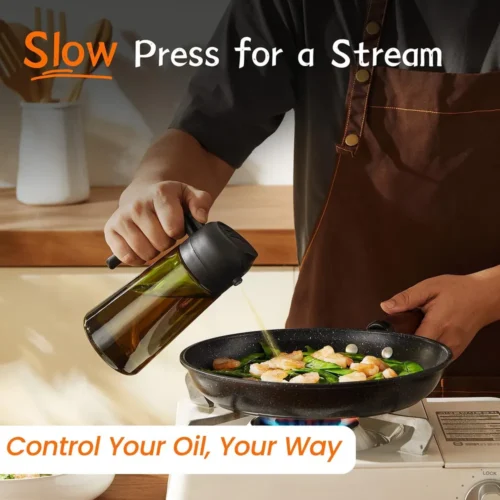 Oil sprayer bottle pouring a slow stream into a pan