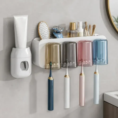 Toothpaste dispenser and toothbrush holder with top shelf in a bathroom